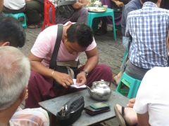 Dealing in precious gems at a traditional tea house